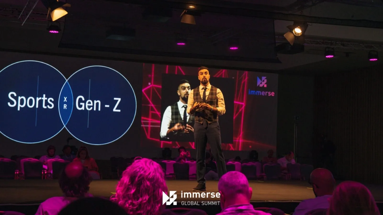 David Olim presenting “Sports × Gen-Z” on stage at Immerse Global Summit