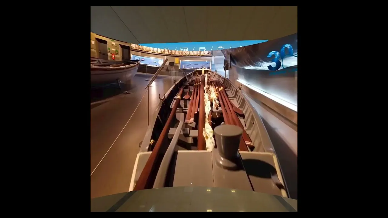 A historic wooden boat inside a museum, viewed in 3D
